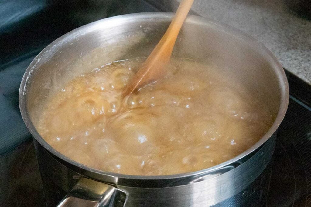 fudge mixture boiling in a saucepan