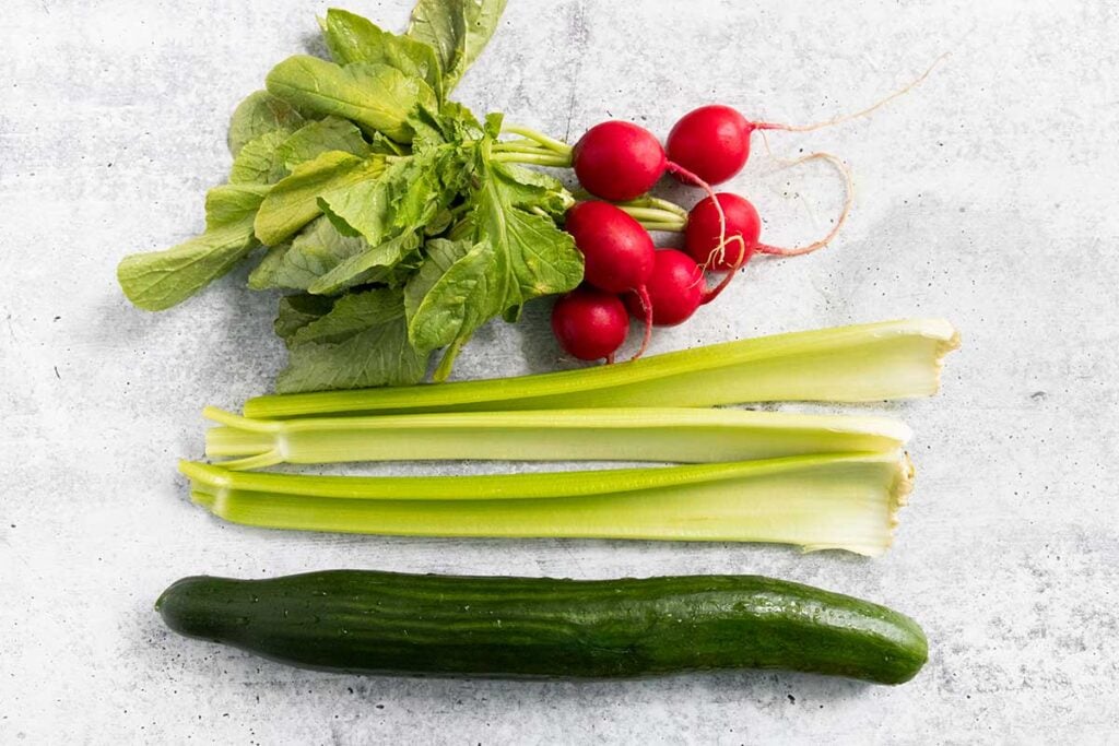 fresh cucumber, radishes, and celery