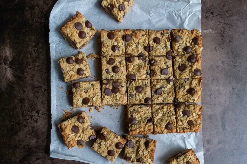 oatmeal chocolate chip bars on parchment paper