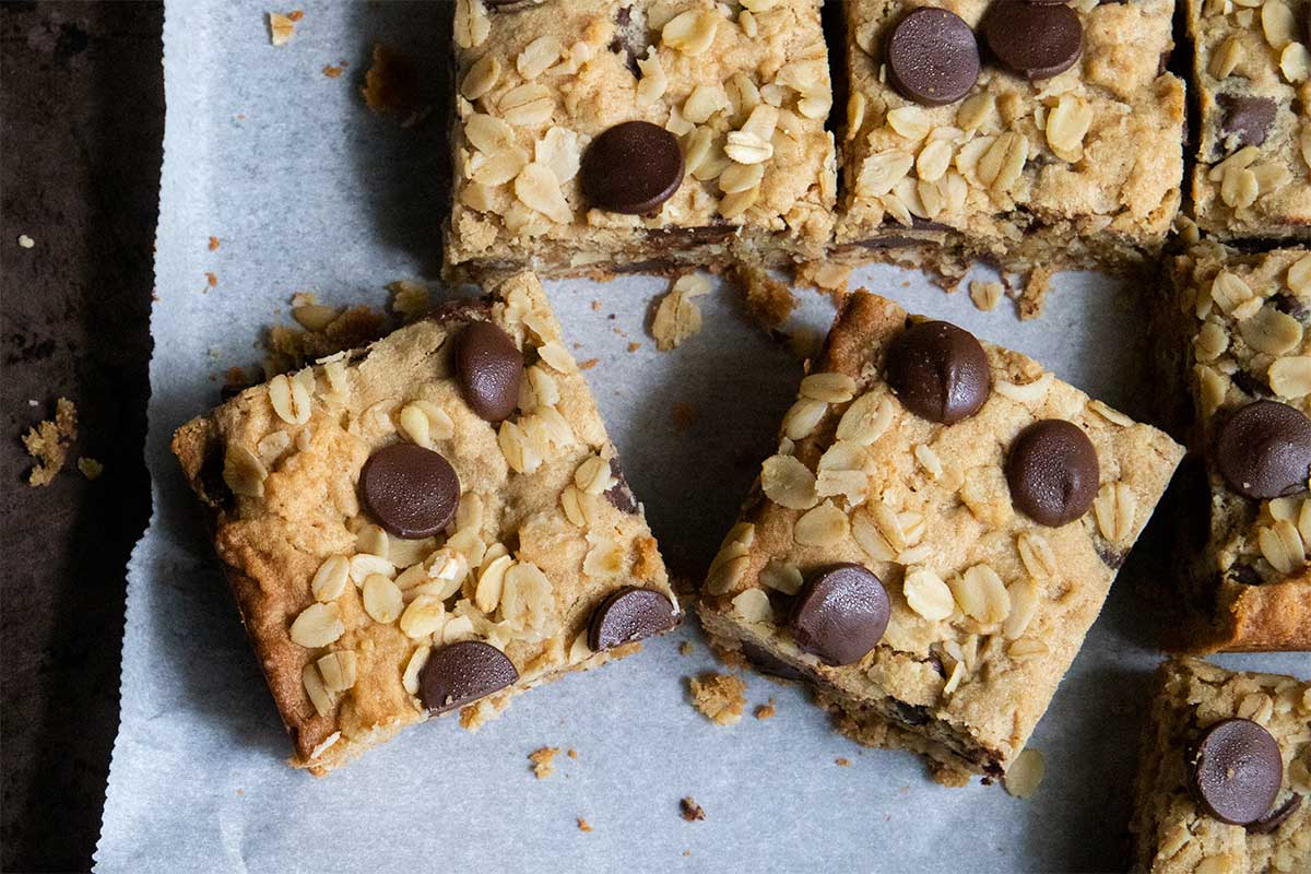 oatmeal chocolate chip bars on parchment paper