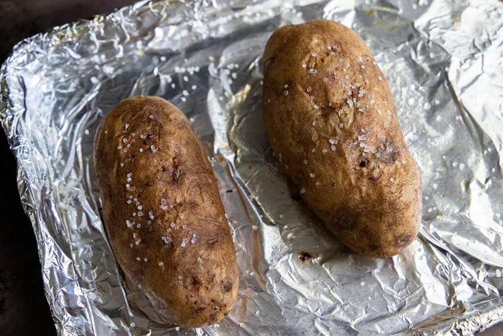 Potatoes on a foil lined baking sheet