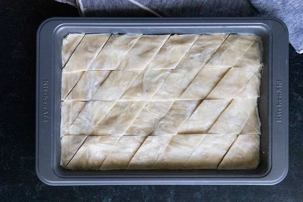 diamond cuts into the pastry in a baking pan