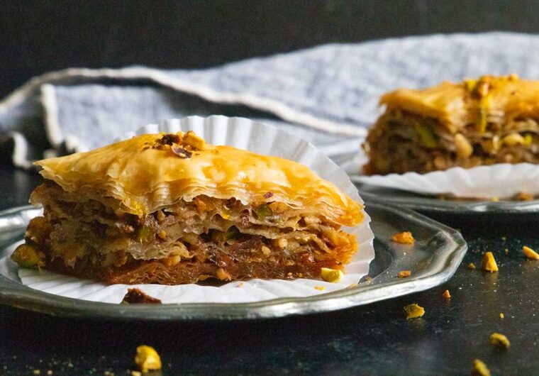 baklava slices on sliver plates