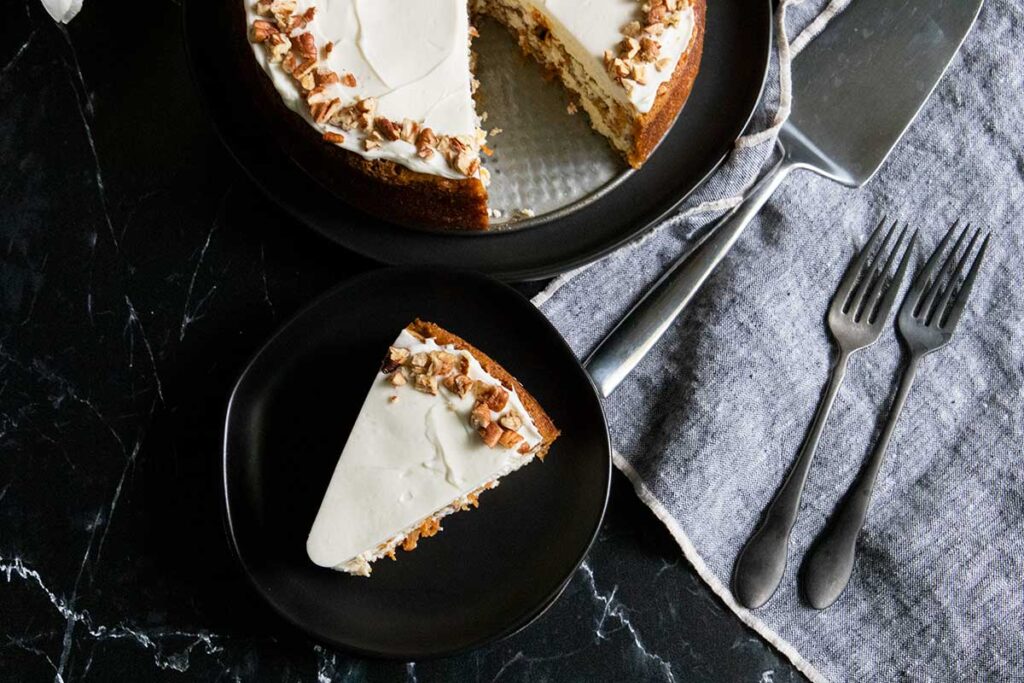 slice of cake on black plate