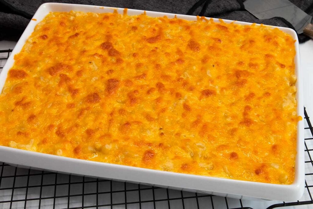 Baked macaroni and cheese in a white baking dish.