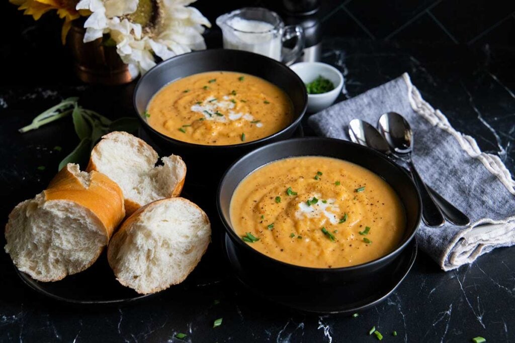 soup in black bowls