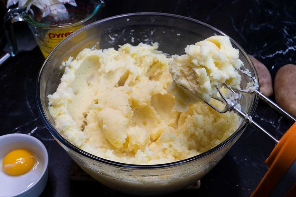 Potatoes blended with hand mixer.