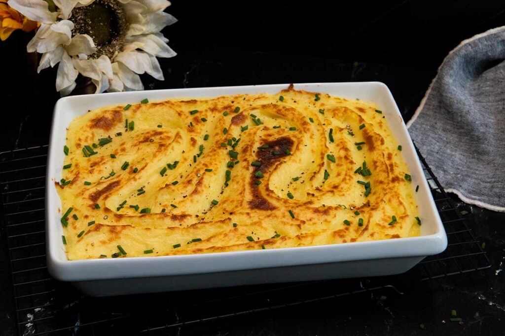 whipped potatoes in a white casserole dish