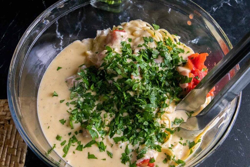 casserole ingredients in a glass mixing bowl