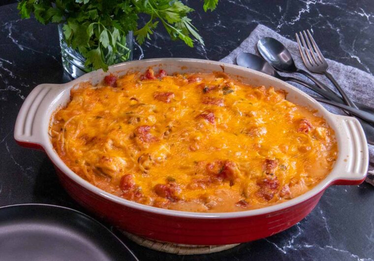 chicken spaghetti in a red casserole