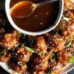 Asian inspired meatballs with sauce.