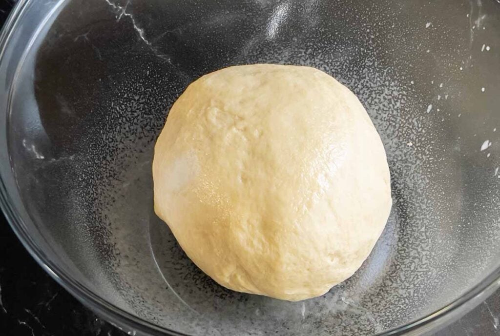 dough in a glass bowl