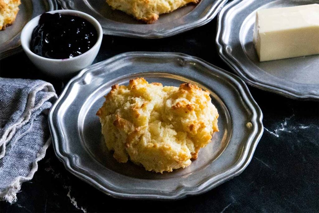 buttermilk drop biscuits on silver plates