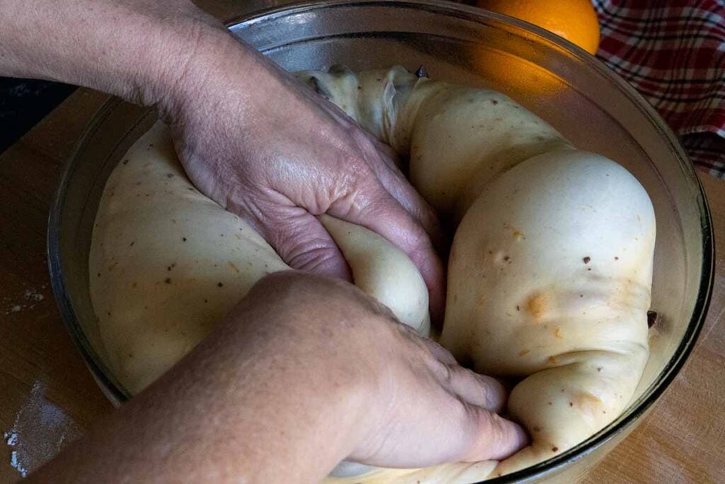 punching the risen dough down