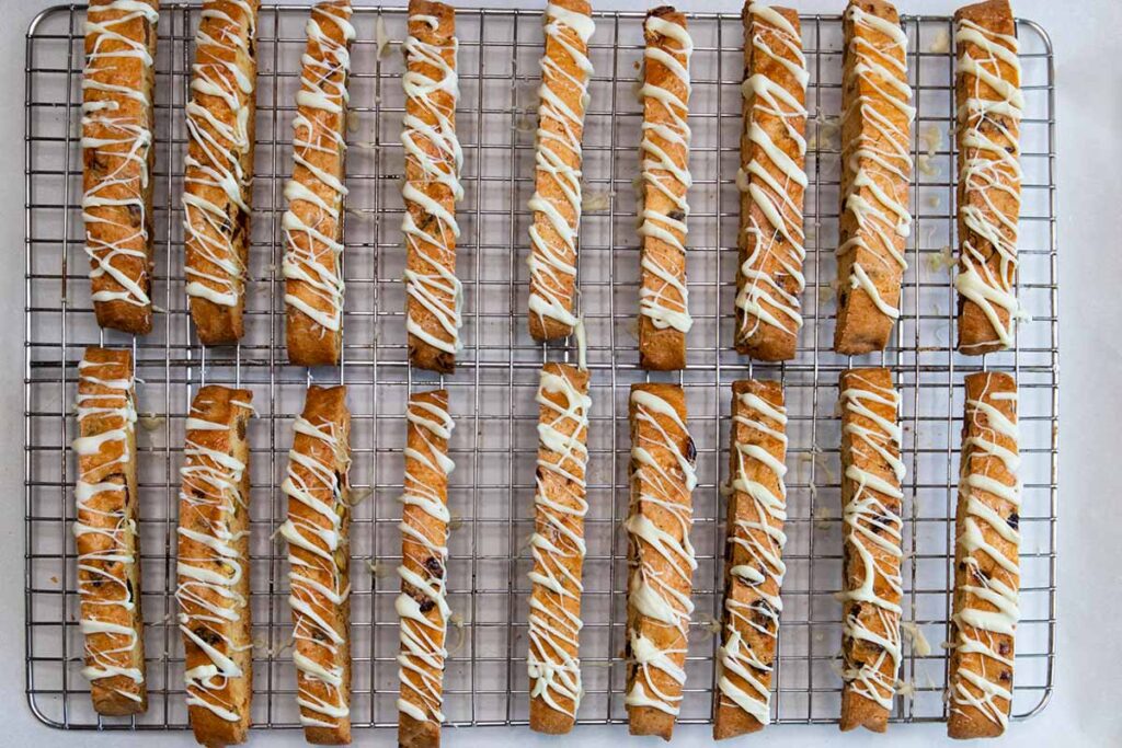Biscotti drizzled with white chocolate.