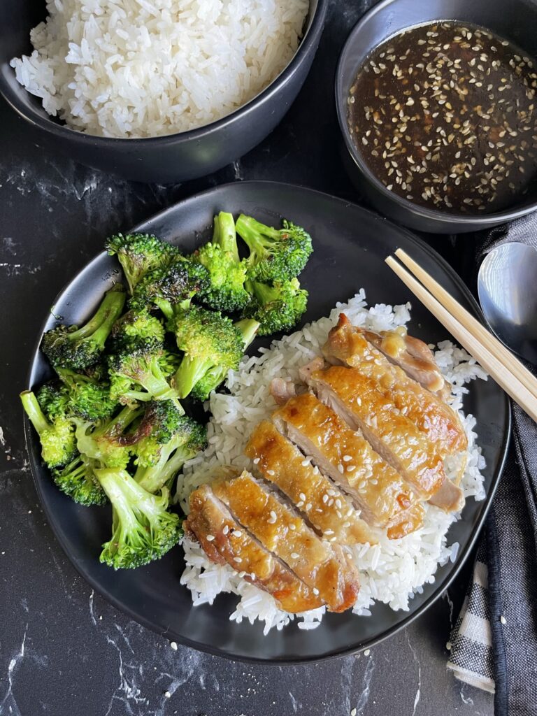 Chicken Teriyaki Thighs with rice and broccoli. Sauce on the side