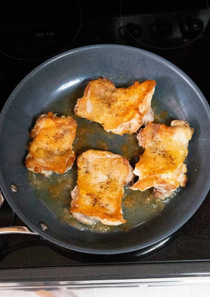 Crispy chicken thigh, one side cooked