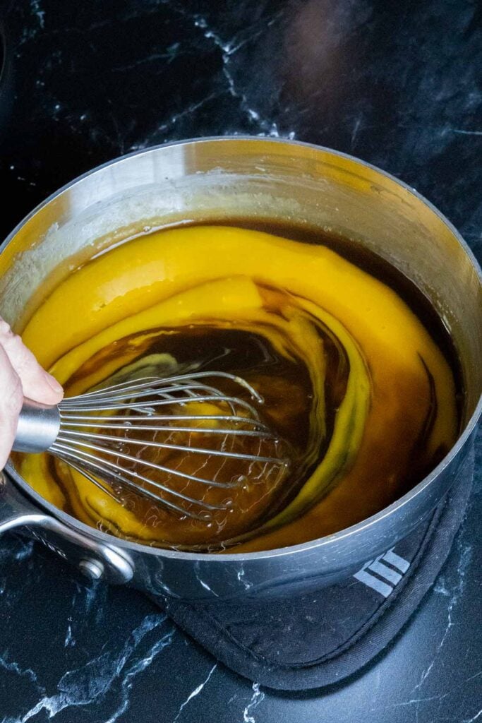 eggs being whisked into pie filling