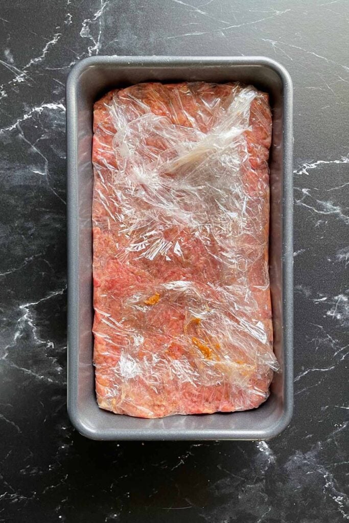 uncooked meatloaf in a loaf pan