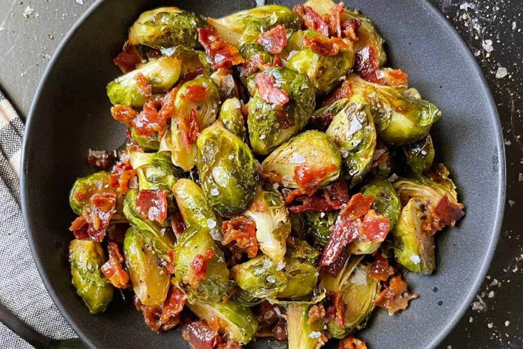 A bowl of roasted brussels sprouts with honey butter