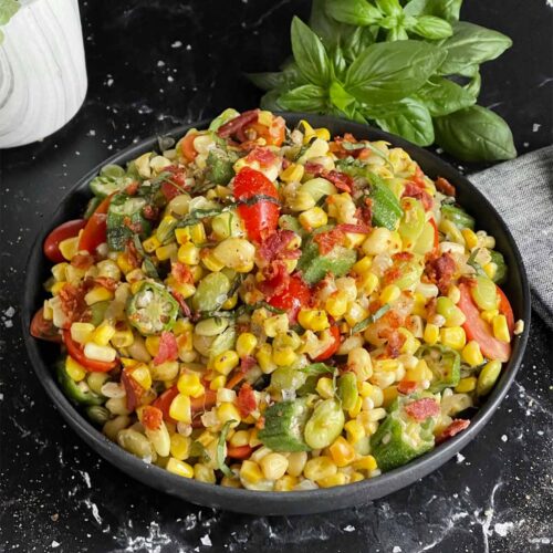succotash in a black bowl
