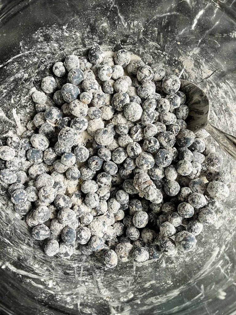 Blueberry mixture in a glass bowl.