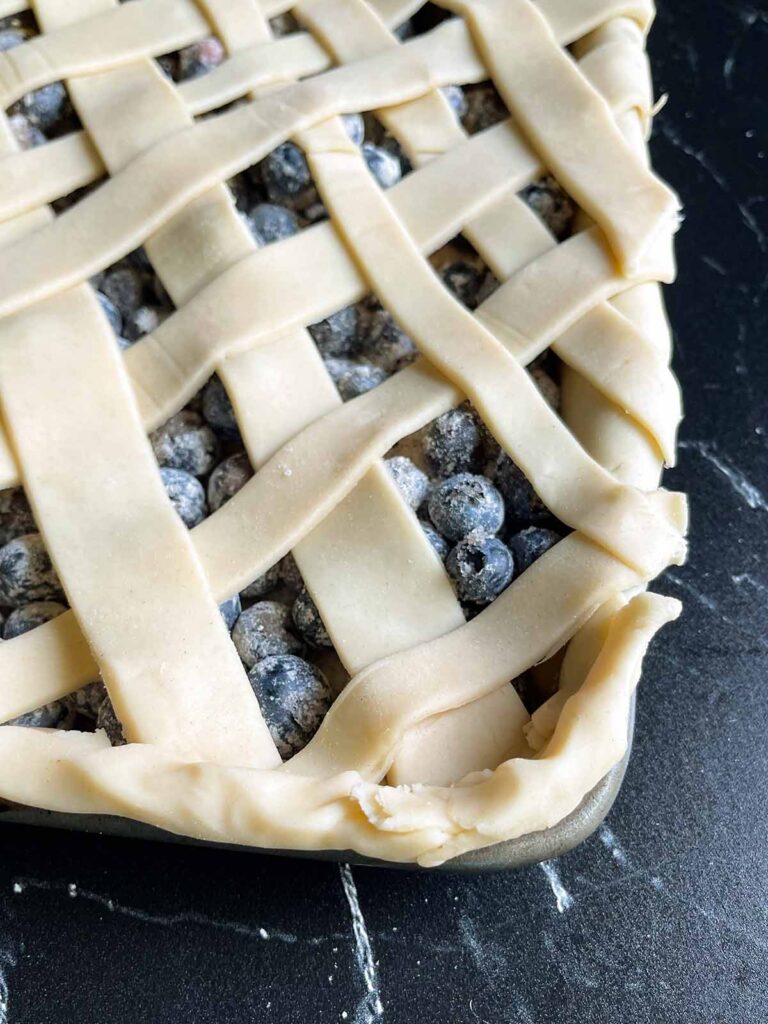 A close up of the corner of the lattice crust.