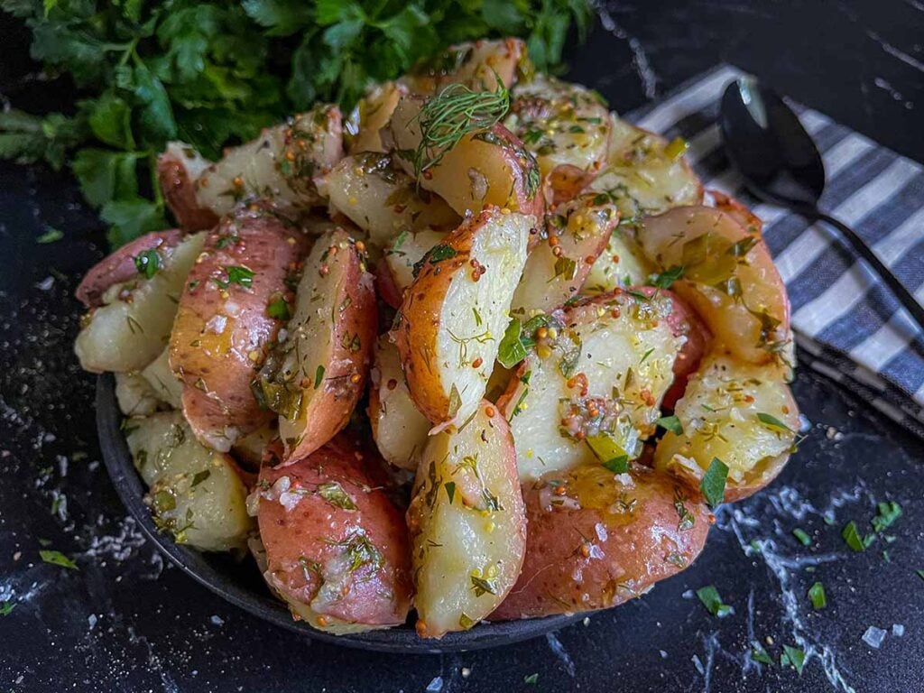 Herb potato salad on a plate.