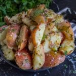 Herb potato salad on a plate.