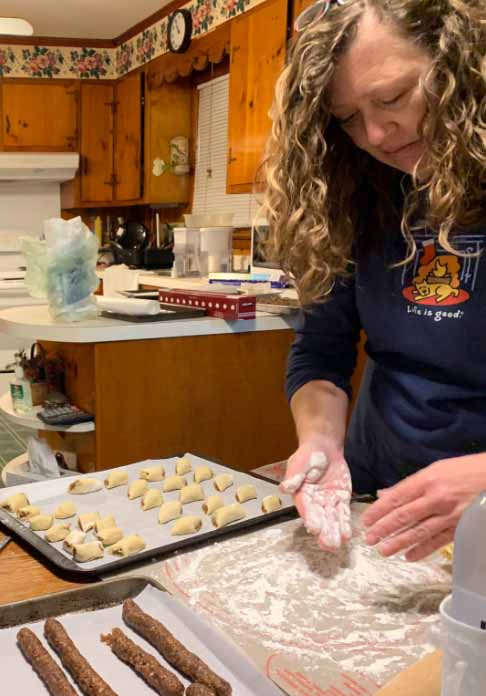 Leigh Harris making fig cookies, a Christmas tradition.