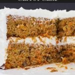 Whole carrot cake with pieces removed to show the inside of the cake.