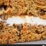 A close up of a slice of carrot cake.