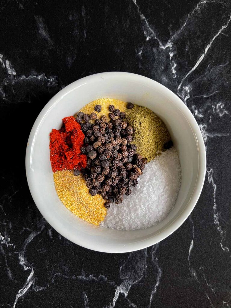 A ramekin with dry brine spices.