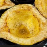 Roasted acorn squash halves.