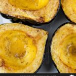 Roasted acorn squash halves.