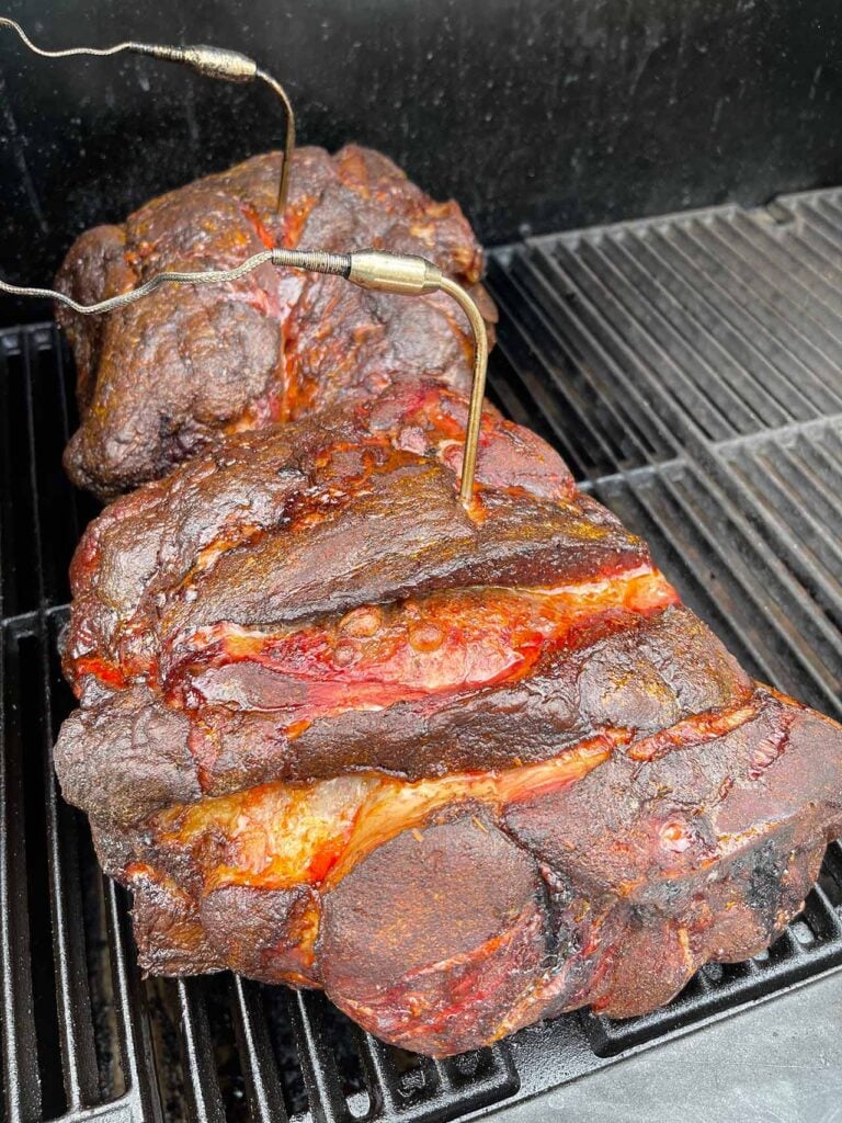 Two smoked pork butts at about 6 hours into the smoking process.