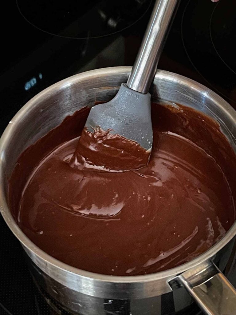 Dark chocolate chips stir into the boiled ingredients for fudge.