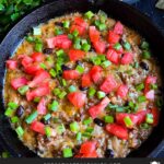 Queso fundido in a cast iron skillet.