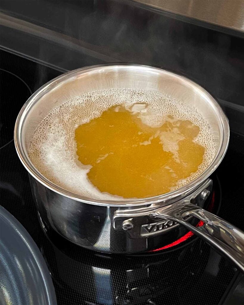 Chicken stock on a low simmer.