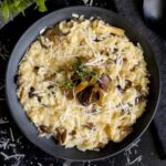 Mushroom Risotto in a dark bowl.