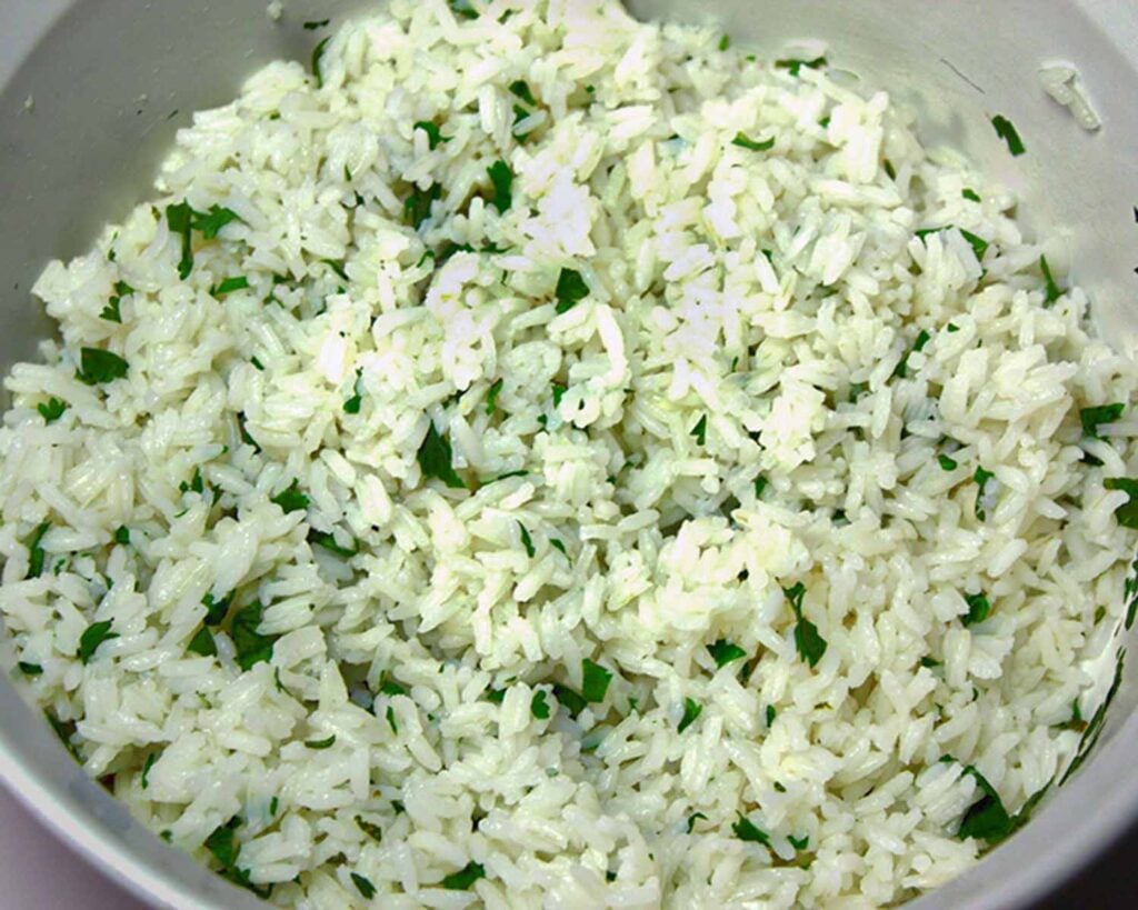 Cilantro lime rice in a white bowl.