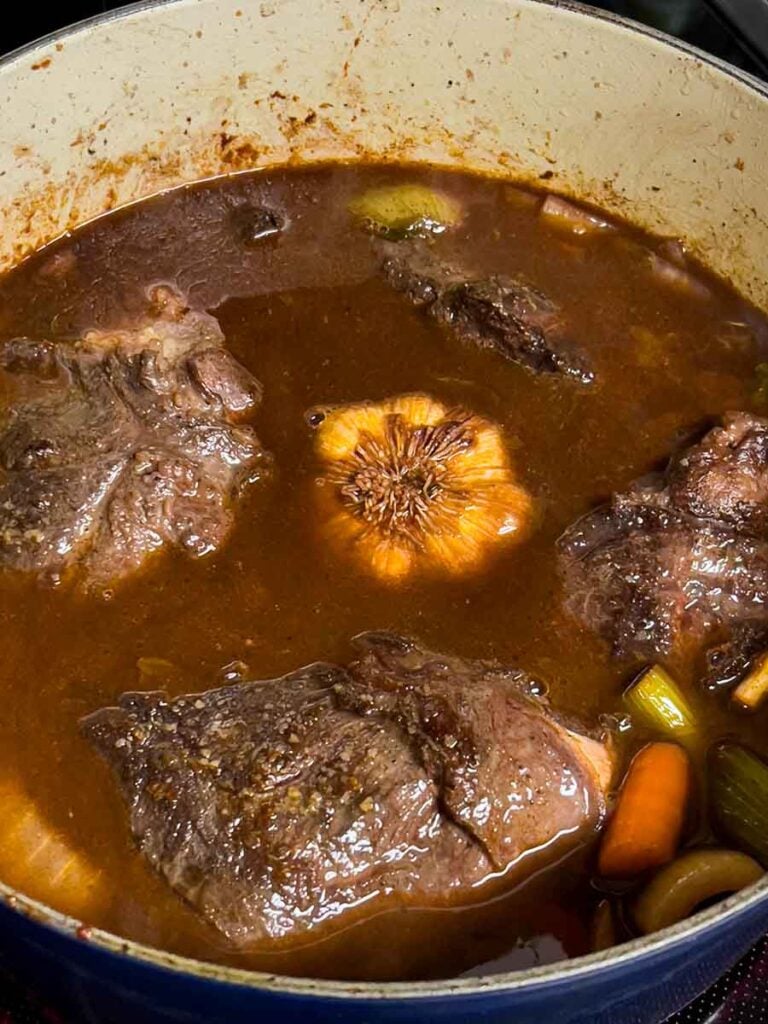 Beef cheeks with vegetables about to start braising.