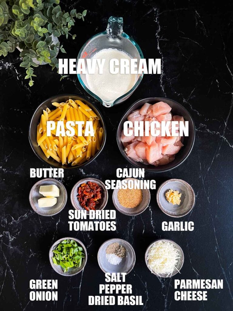 Ingredients needed to make Cajun chicken pasta.