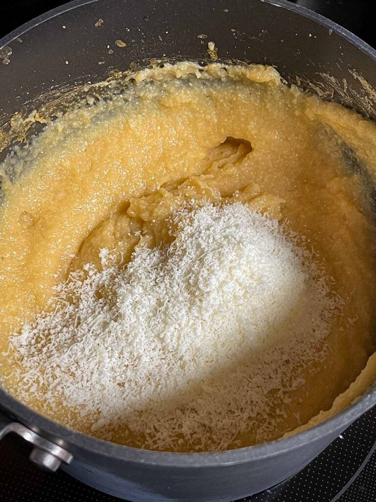 Parmesan cheese added to polenta.