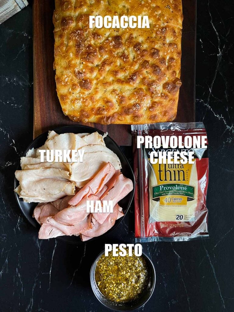 Ingredients for a pesto focaccia sandwich.