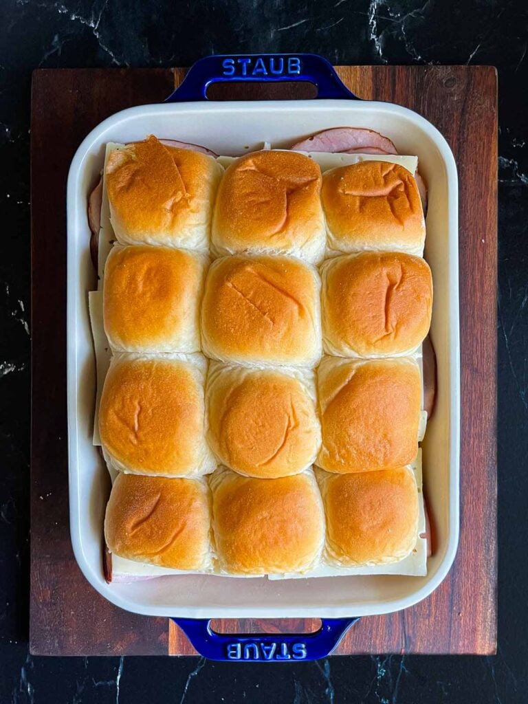 Monte Cristo sliders in a baking dish.