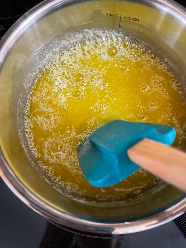 Butter on the boil in a sauce pan.