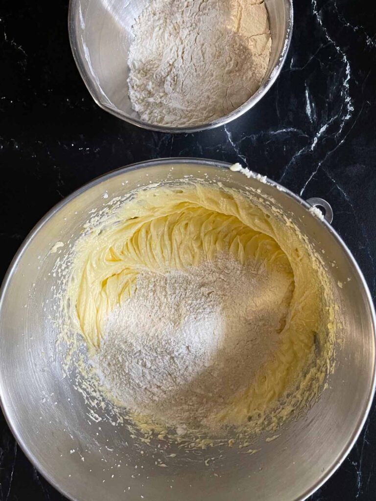 Ingredients for old fashioned sour cream pound cake in mixing bowls.