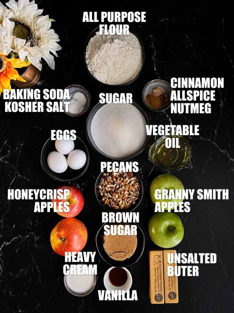 Apple Dapple labeled ingredients laid out on a dark surface.