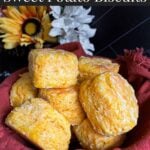 Sweet potato biscuits in a red lined cloth basket.